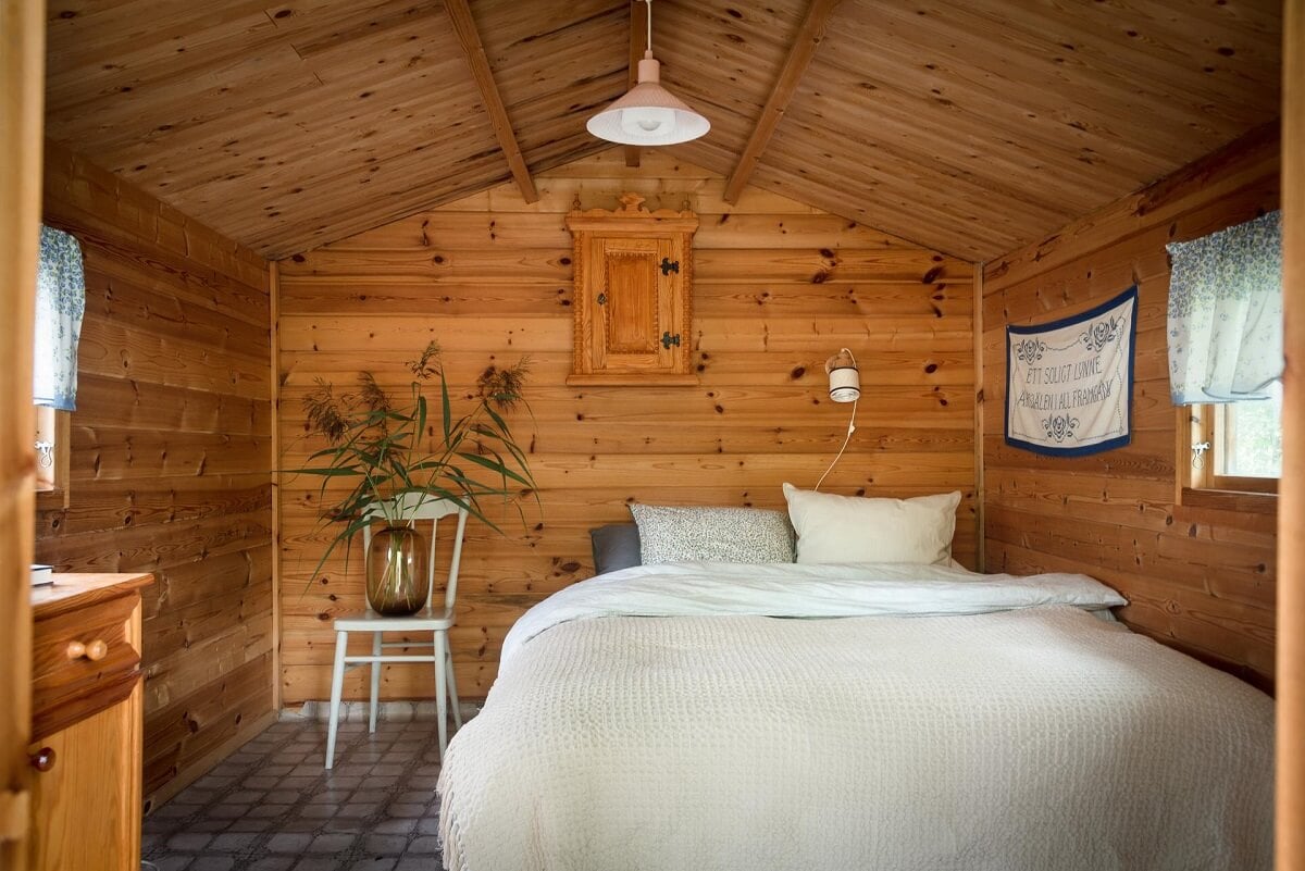 A Traditional Summer House Cabin in Sweden 14 wooden bedroom traditional wooden summer cottage sweden nordroom