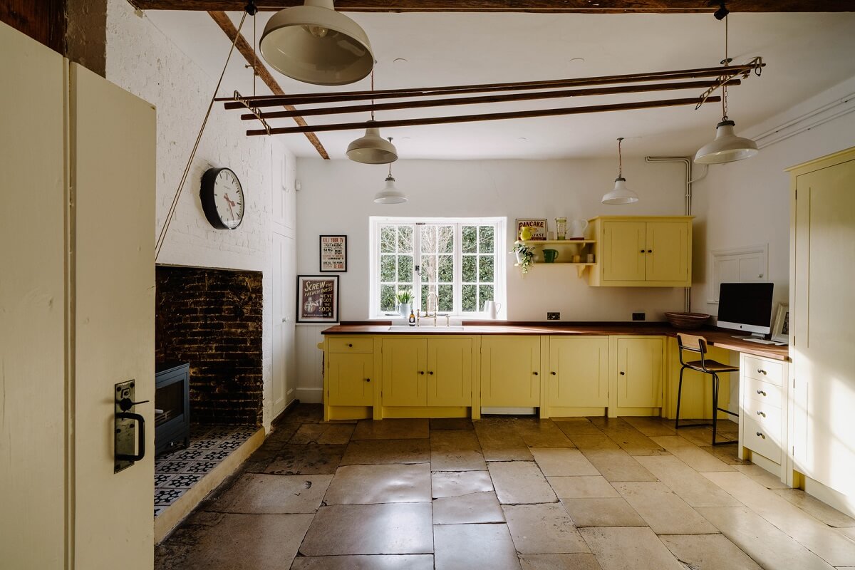 An 18th-Century Historic House with an Amazing Kitchen 8 yellow cupboards in utility room
