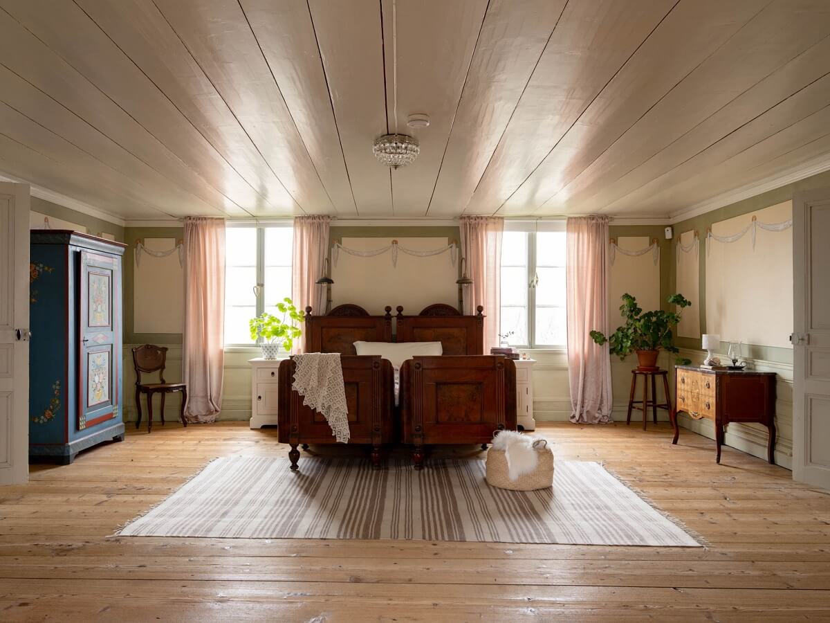 Original Character and Grand Rooms in a Swedish Country House 23 antique wooden bed