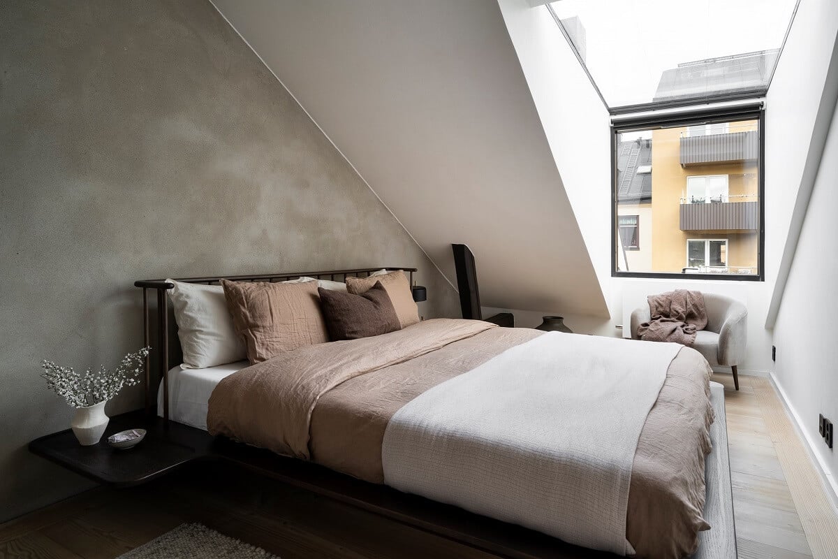 A Stylish Scandinavian Duplex with Custom-Made Cabinets 20 attic bedroom with gray wall