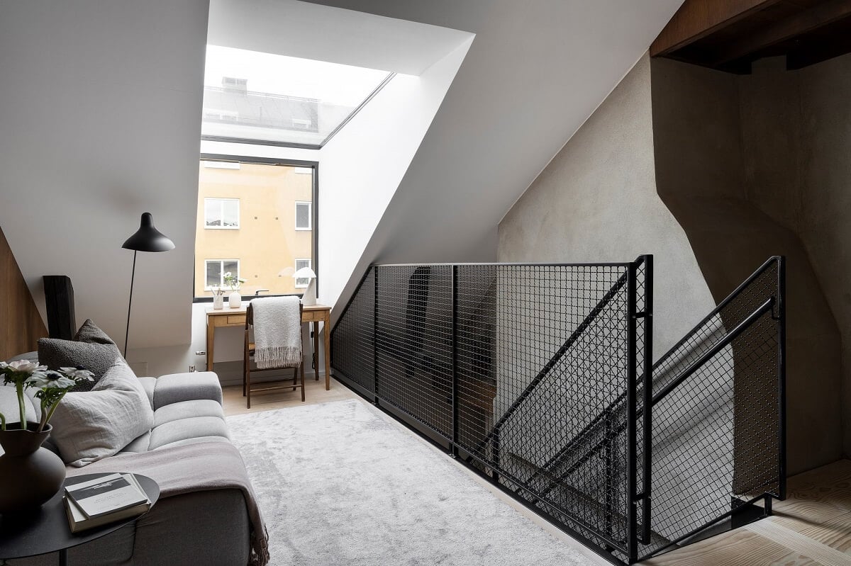 A Stylish Scandinavian Duplex with Custom-Made Cabinets 16 attic sitting room