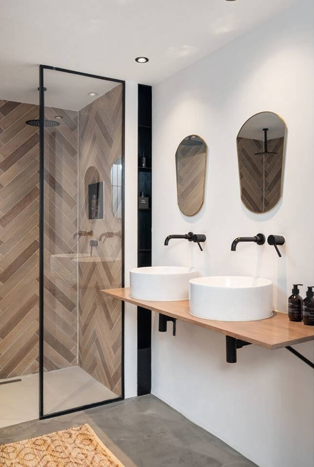 Loft Spaces in a Former School Conversion in Rotterdam 23 bathroom double sink herringbone shower tiles
