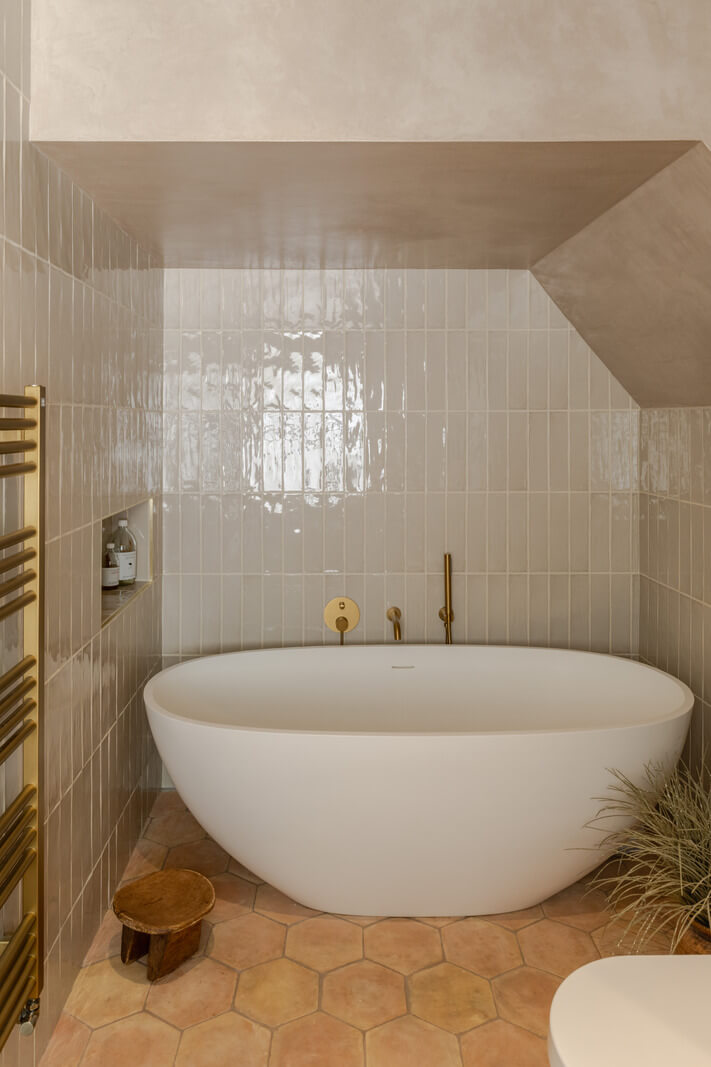 A Green Living Room in a London Maisonette 18 bathroom with hexagon floor tiles and freestanding bath