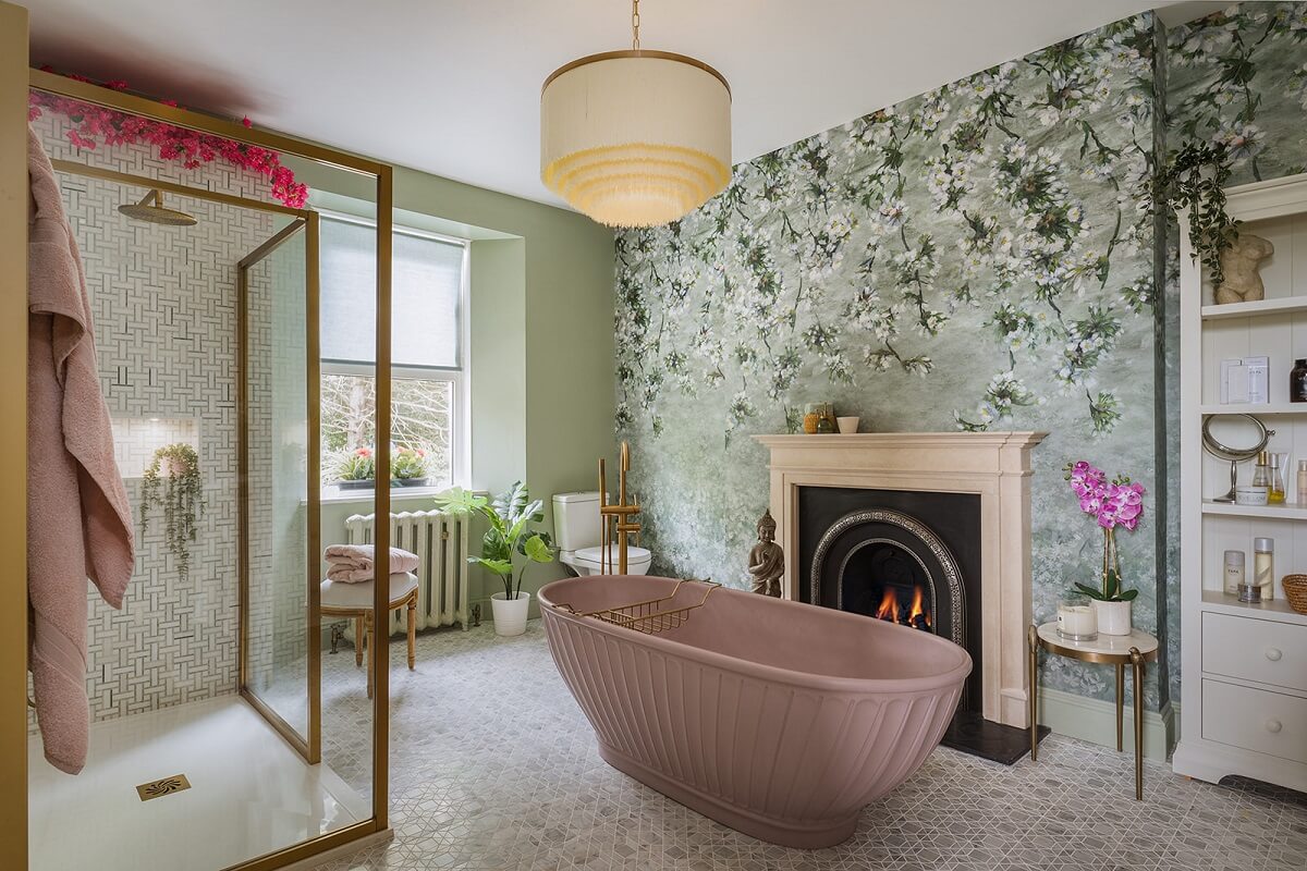 Colorful Interiors and Wallpapers in a Victorian House 13 bathroom with pink bath fireplace and wallpaper