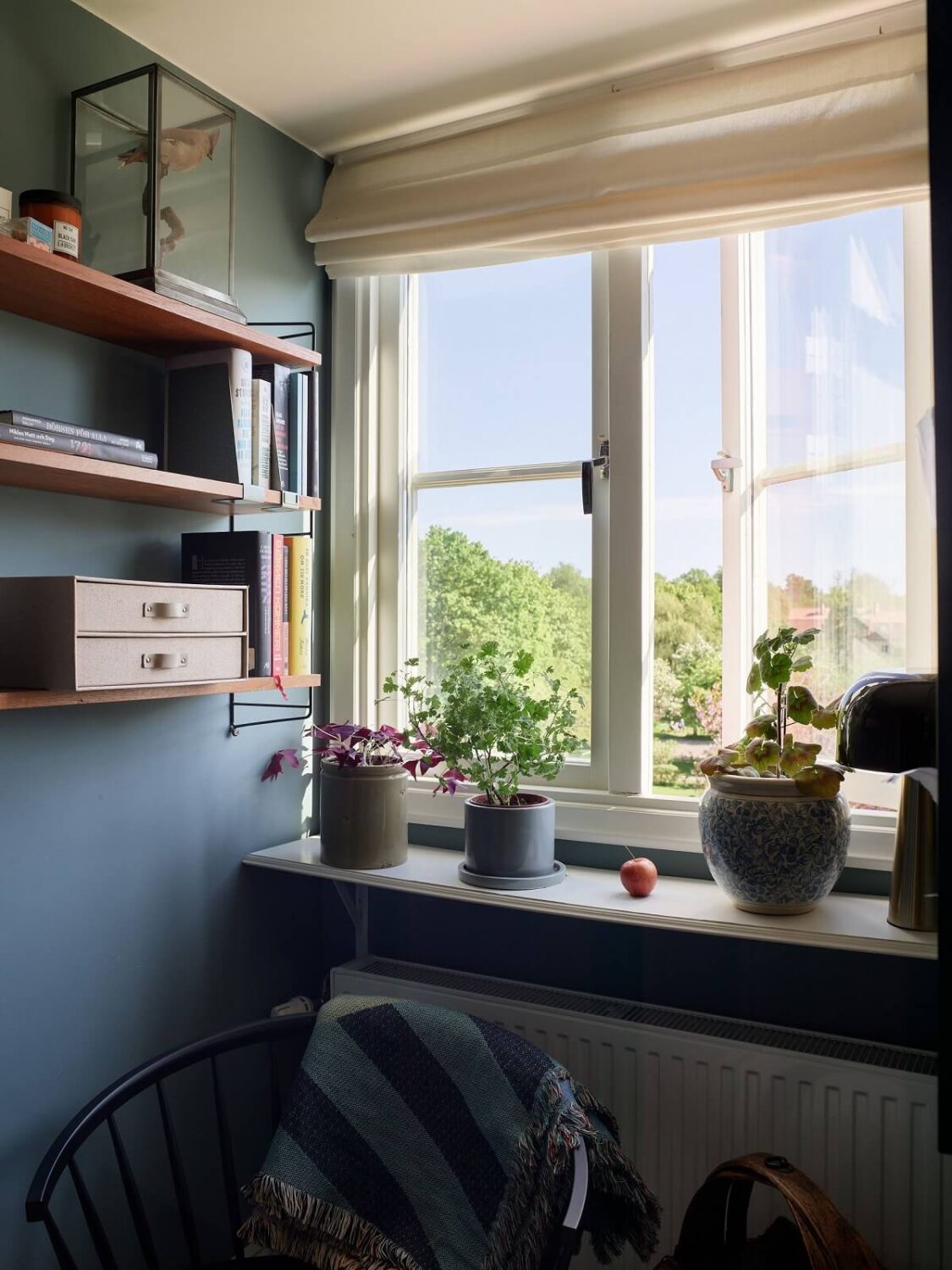 A Cozy Attic Apartment is a Charming Family Home 13 bedroom window seat detail