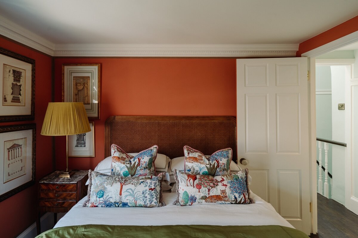 Rich Colors and Patterns in a London Townhouse 20 bedroom with orange walls