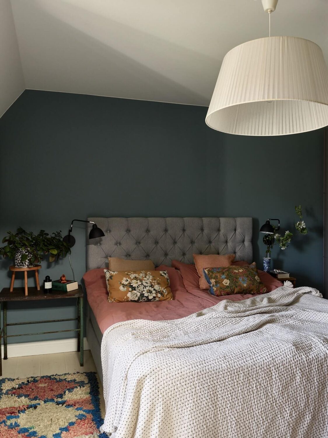 A Cozy Attic Apartment is a Charming Family Home 9 bedroom with slanted ceiling and blue walls