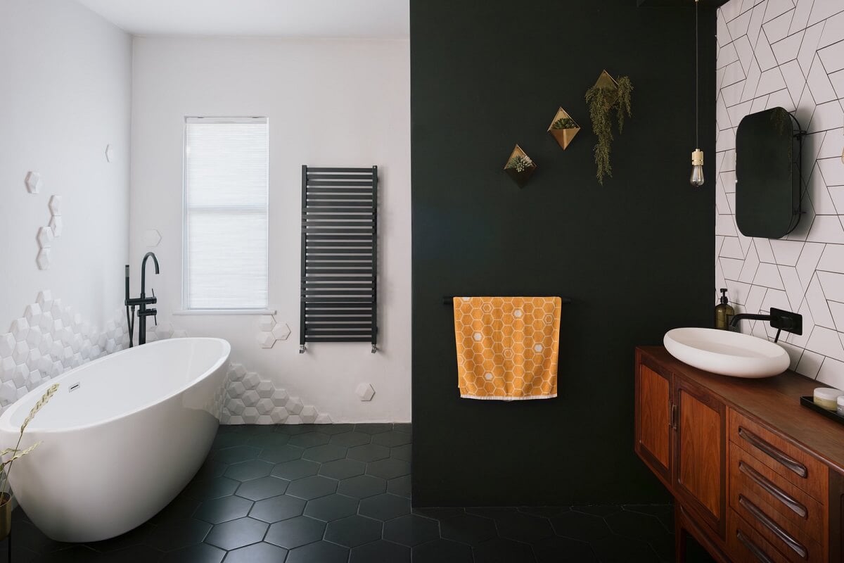 A Deep Blue Color Palette in a London Apartment 9 black and white bathroom with freestanding bath A Deep Blue Color Palette in a London Apartment