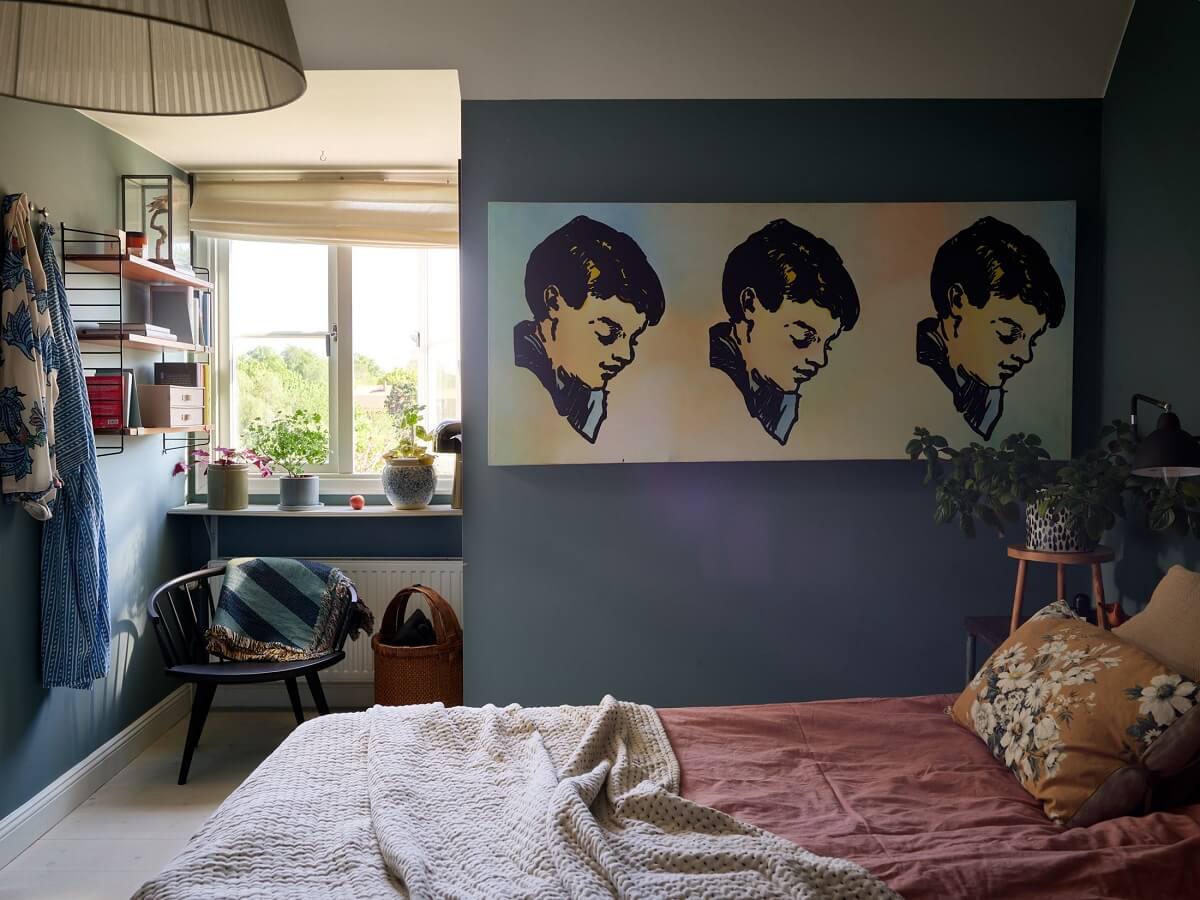A Cozy Attic Apartment is a Charming Family Home 11 blue bedroom with dormer window