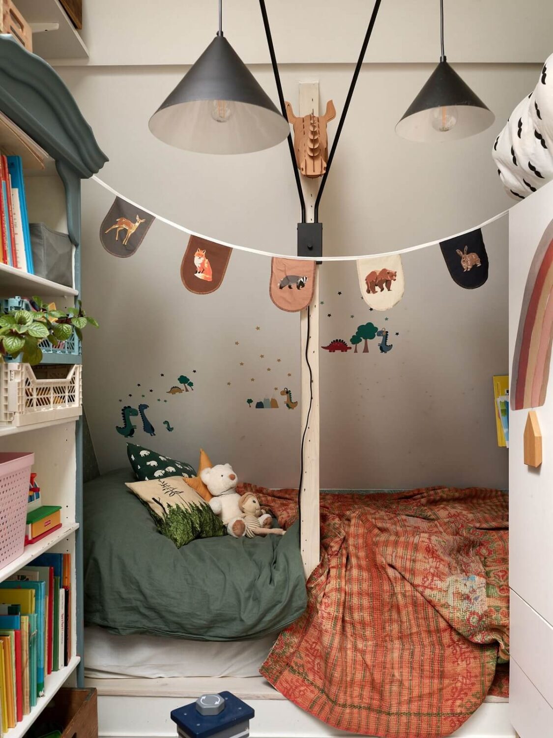 A Cozy Attic Apartment is a Charming Family Home 23 cozy children room slanted ceiling
