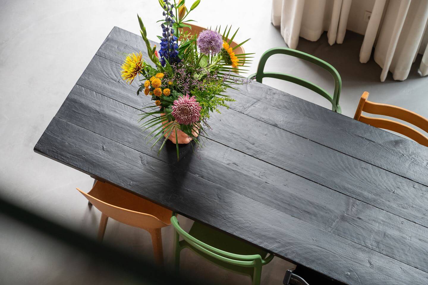 Loft Spaces in a Former School Conversion in Rotterdam 7 dining table with flowers
