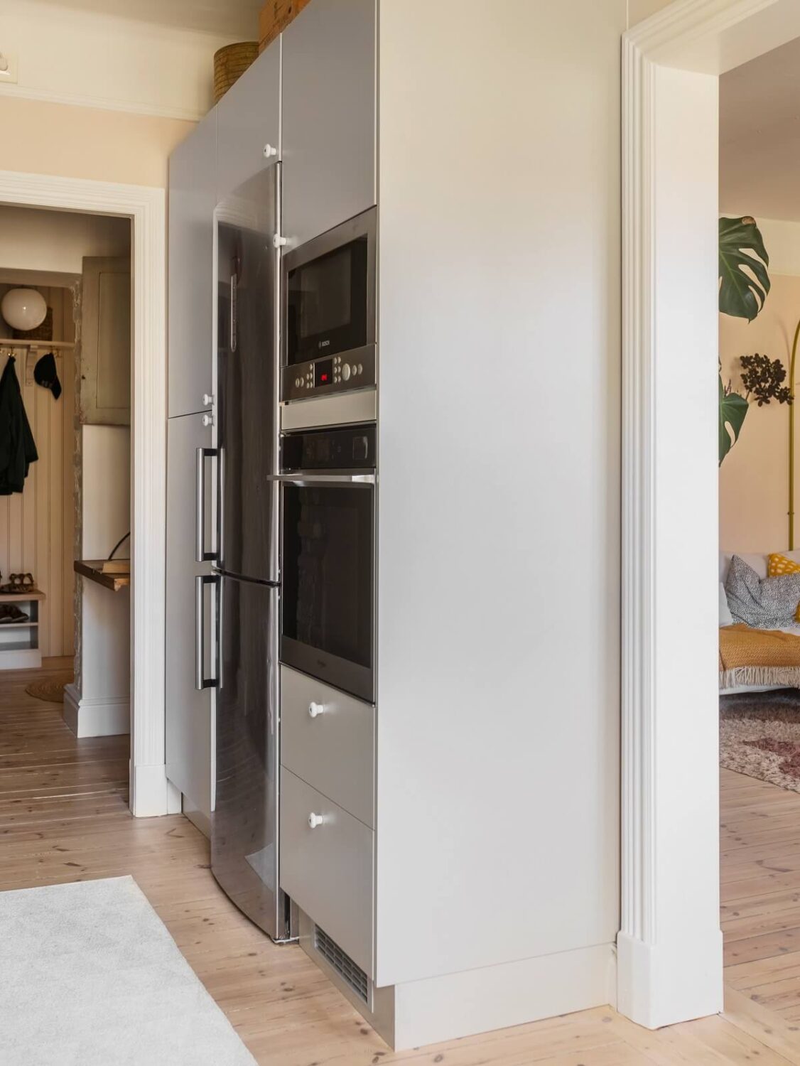 A Light Atmosphere and Wallpapers in a Swedish Apartment 11 floor to ceiling kitchen cabinets