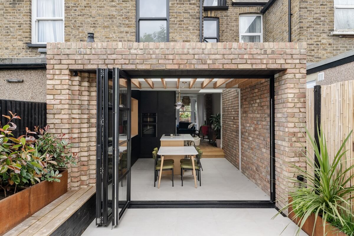A London Terraced House with a Modern Kitchen Extension 23 folding doors kitchen extension