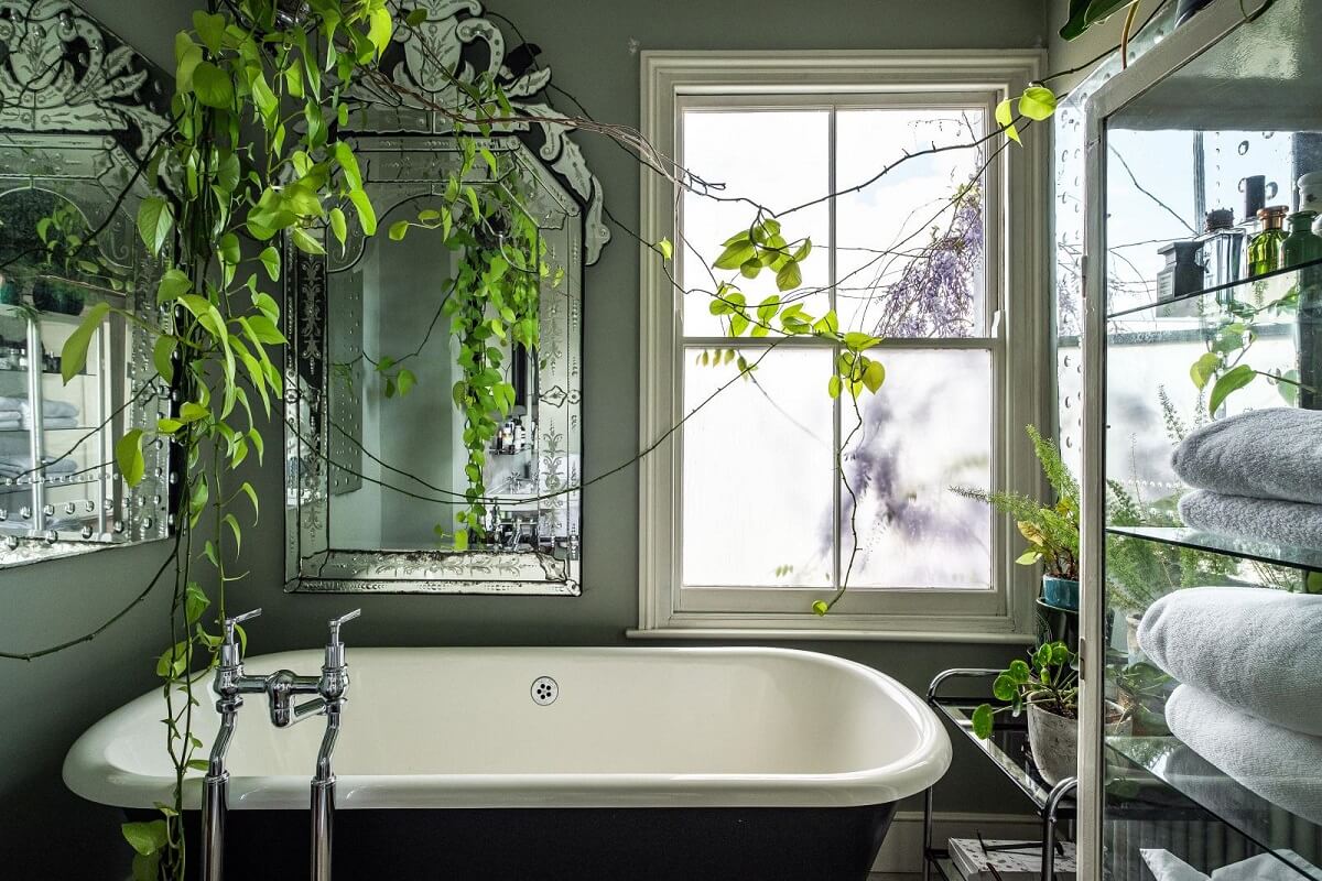 Moody Gray Tones and Period Details in a Victorian Townhouse 18 freestanding bath green bathroom