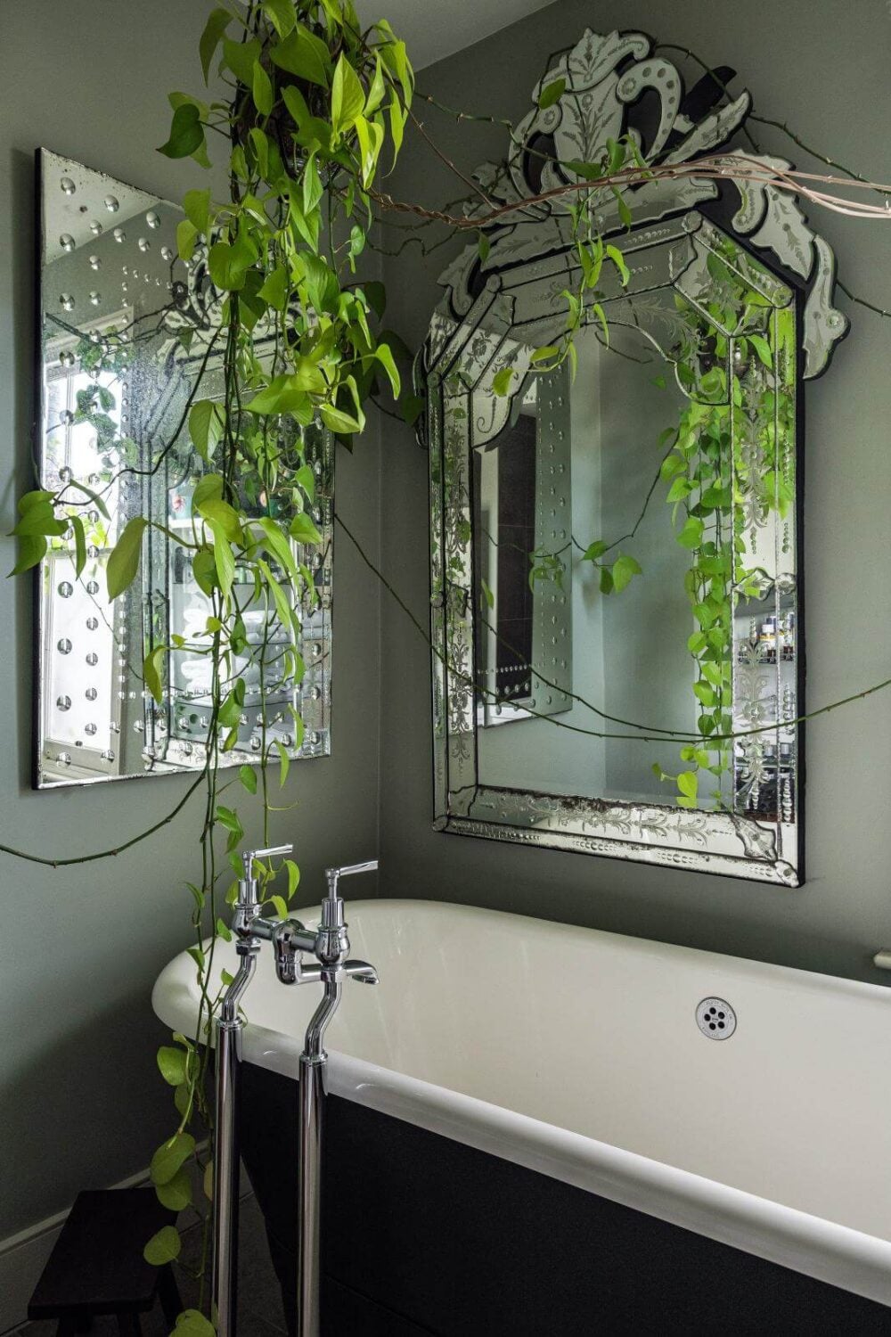 Moody Gray Tones and Period Details in a Victorian Townhouse 17 freestanding bath with hanging plants