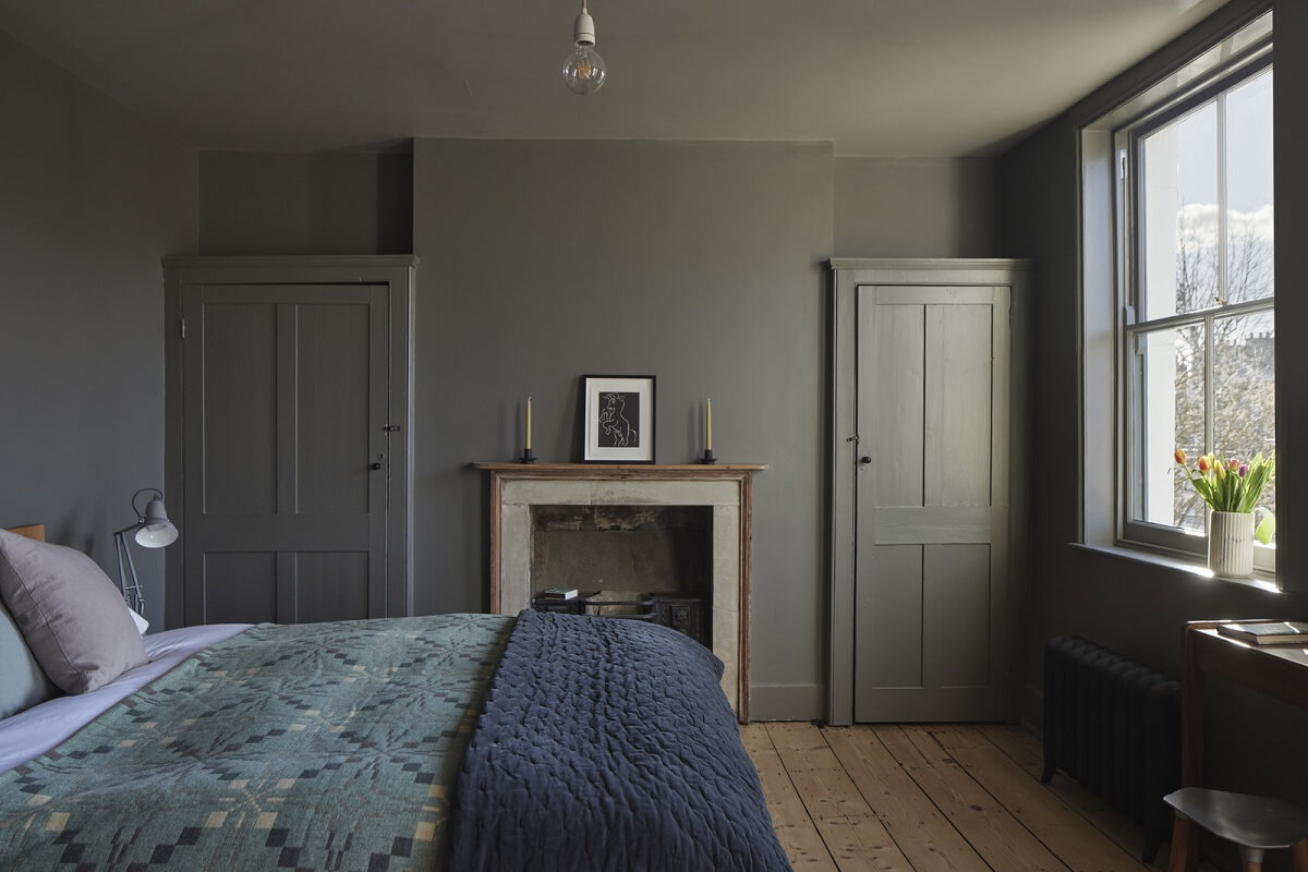 A Georgian Townhouse with a Modern Concrete Extension 26 gray bedroom built in wardrobes fireplace