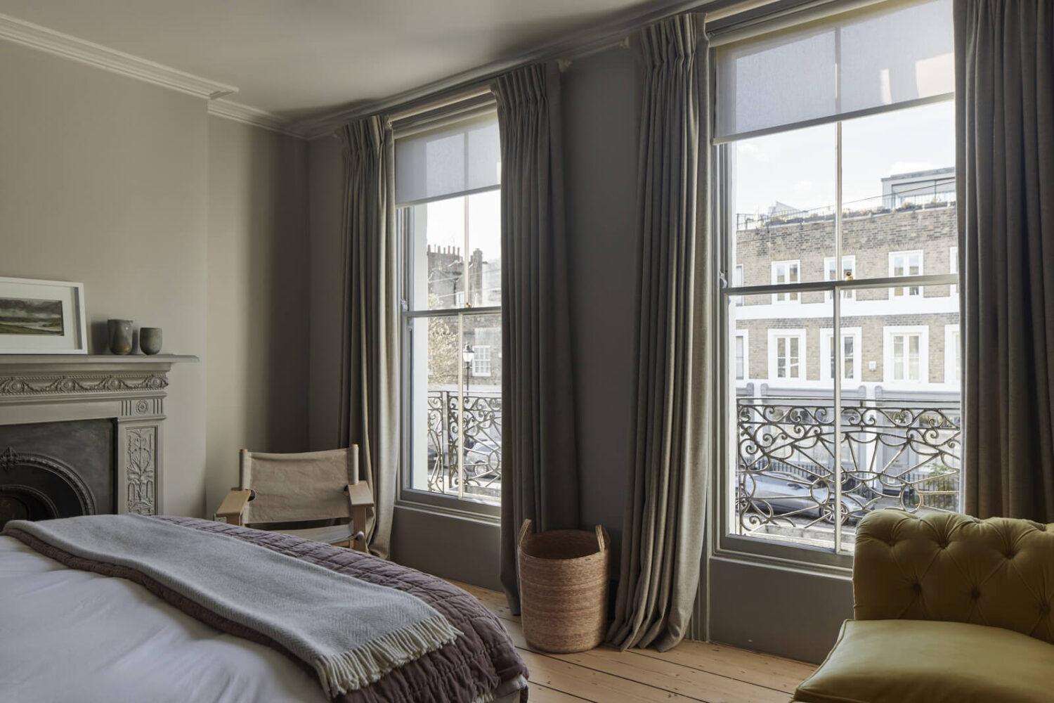 A Georgian Townhouse with a Modern Concrete Extension 23 gray bedroom with fireplace