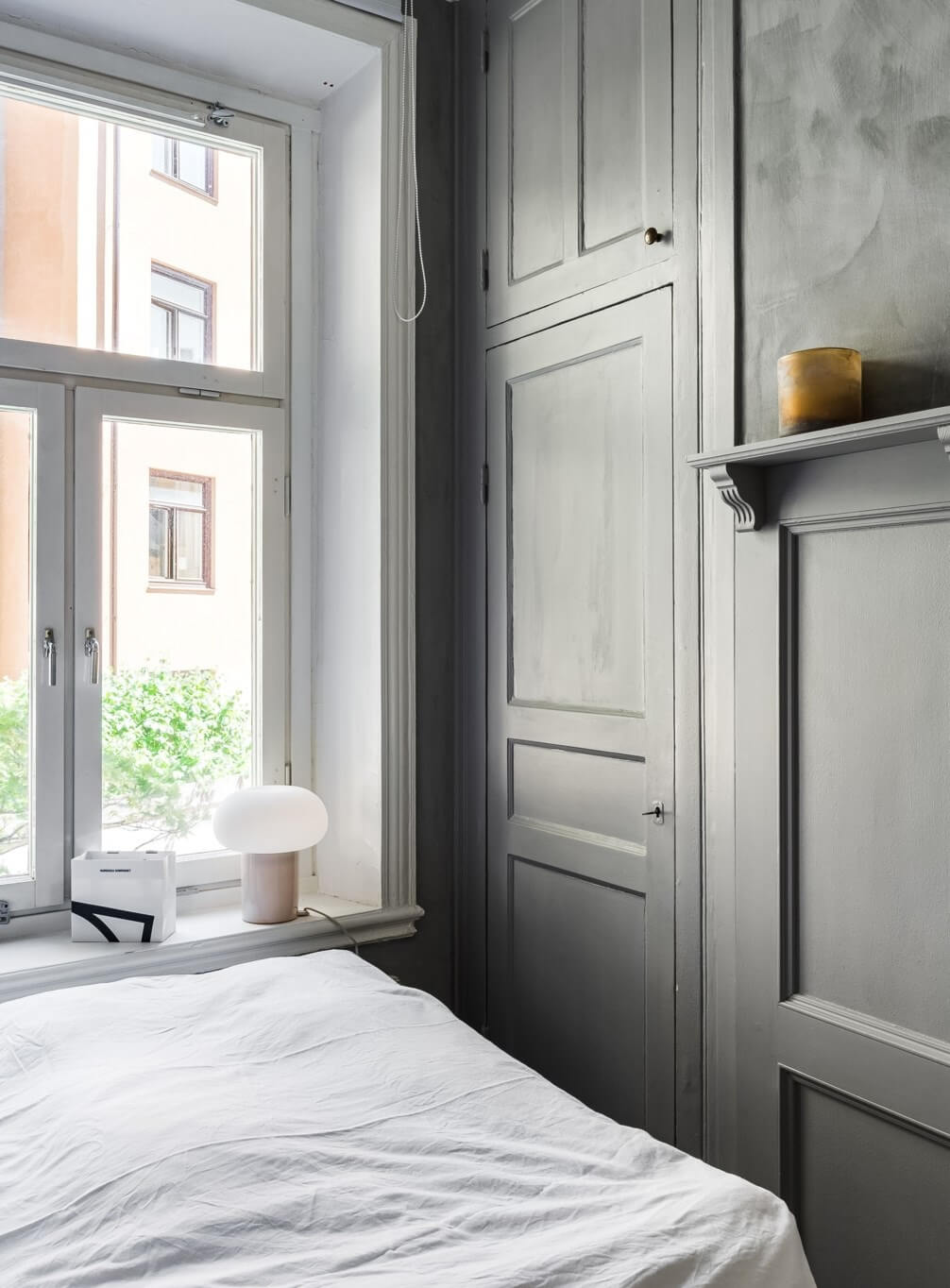 A Small Stockholm Apartment with a Gray Bedroom & Sunny Balcony 10 gray bedroom