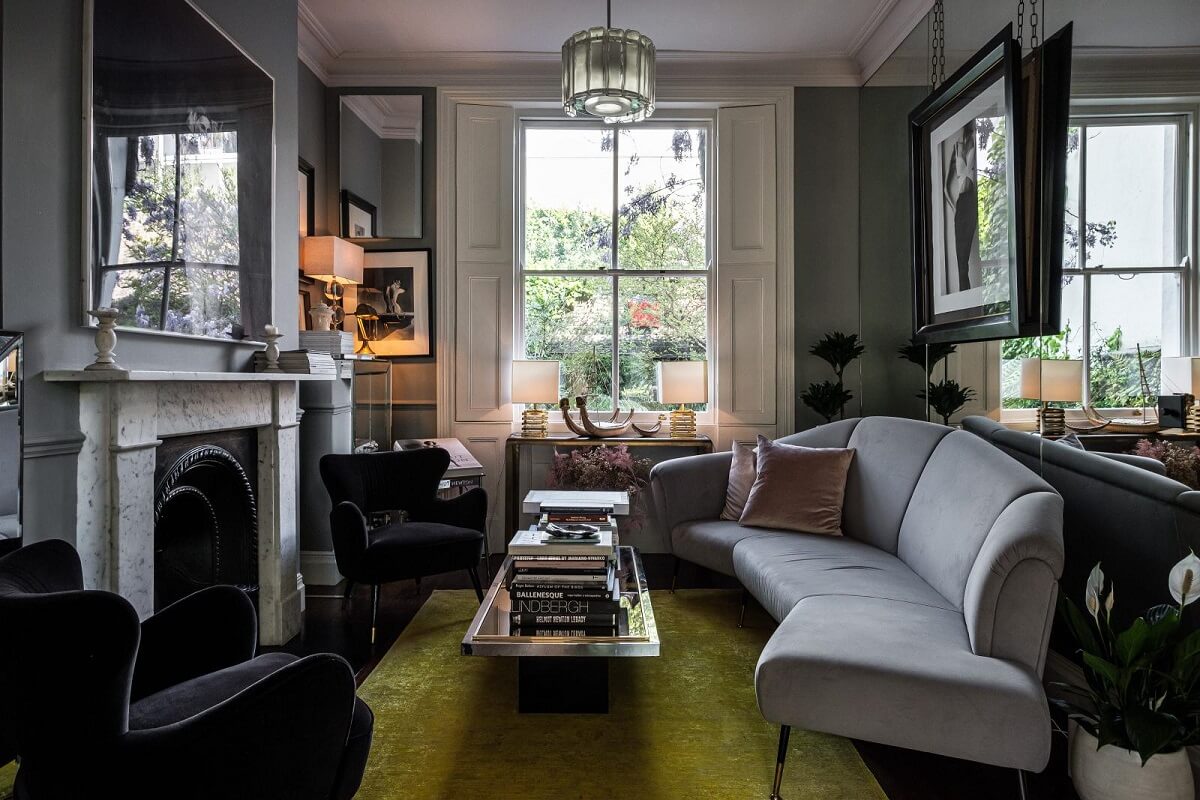 Boost Your Home's Value by Thousands with This Simple Paint Trick! 25 gray sitting room fireplace ochre rug