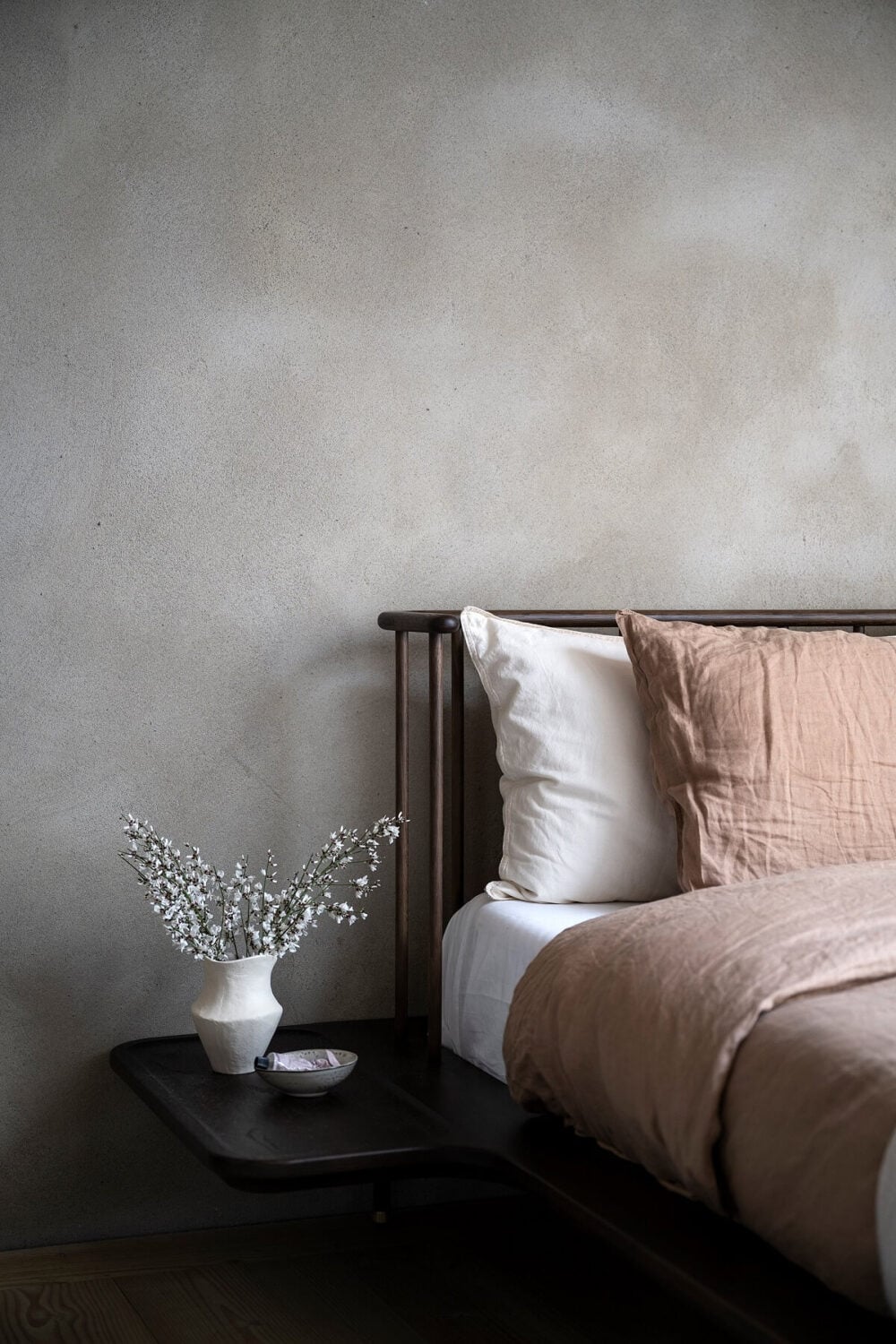 A Stylish Scandinavian Duplex with Custom-Made Cabinets 22 gray wall bedroom pink bedding