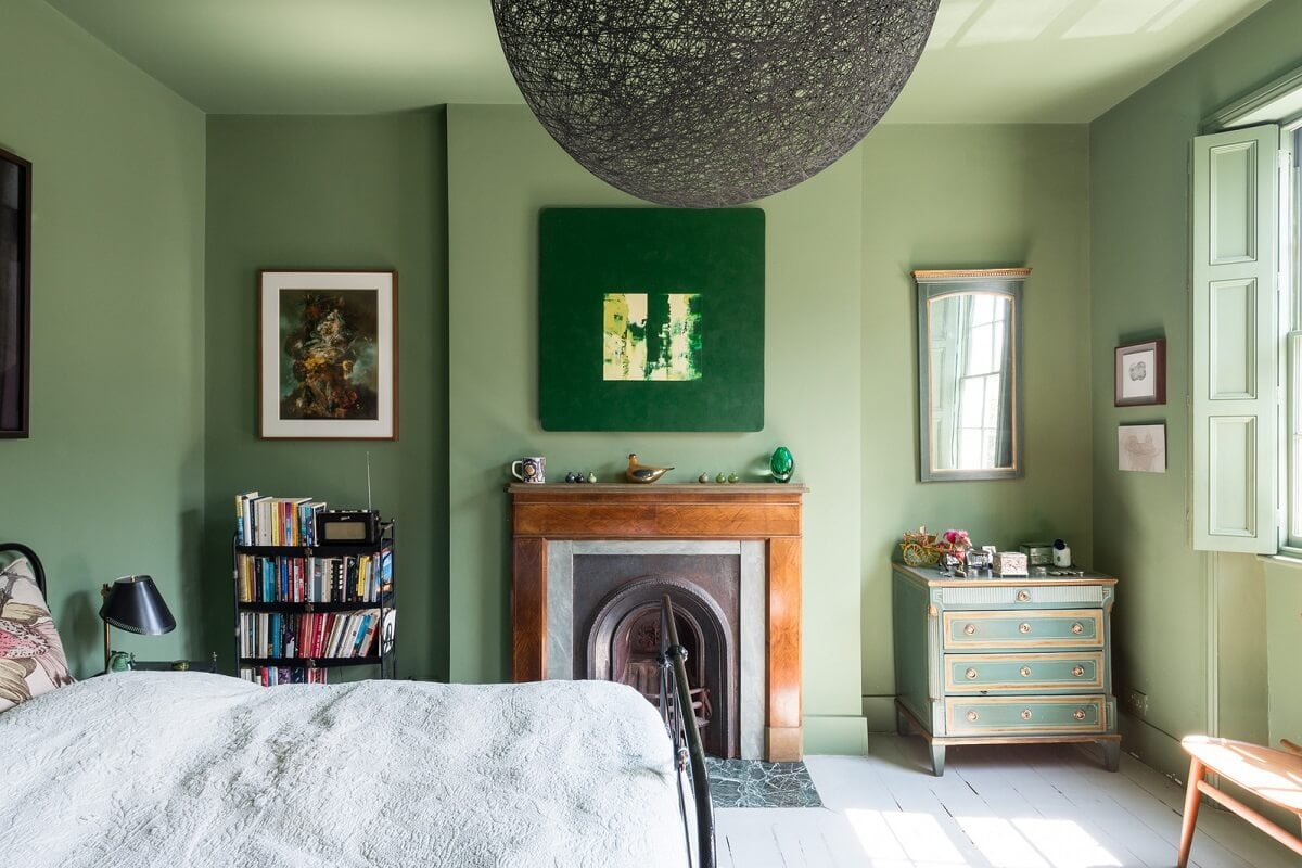 Heritage Colors and Original Details in a London Townhouse 18 green bedroom with fireplace