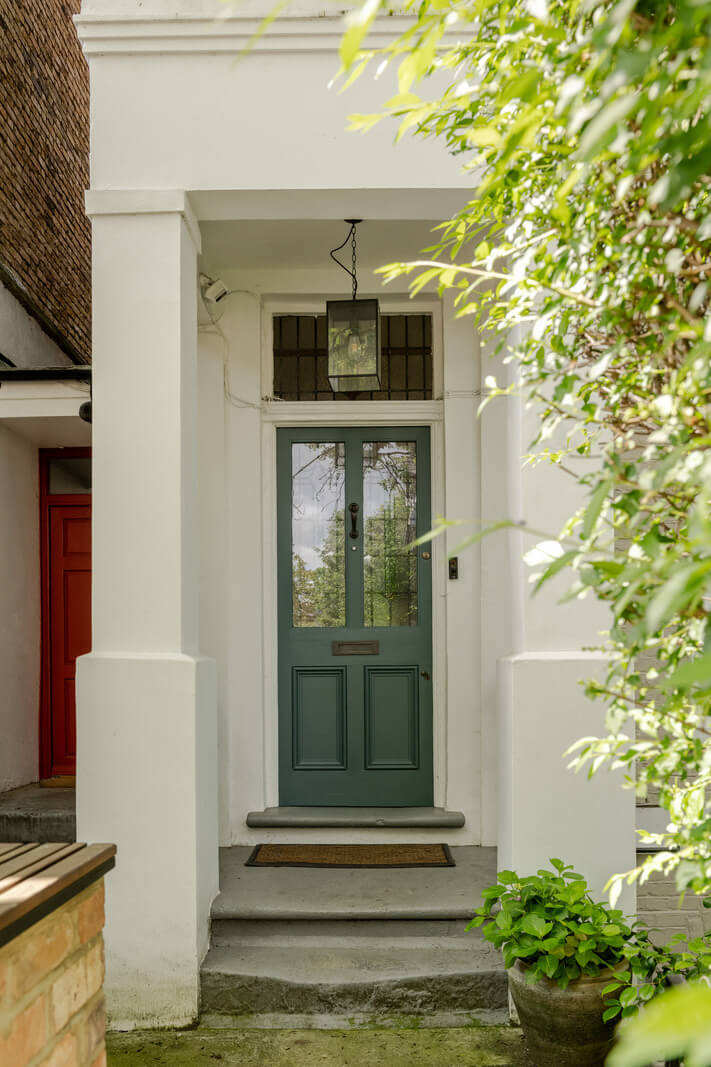 A Green Living Room in a London Maisonette 22 green front door