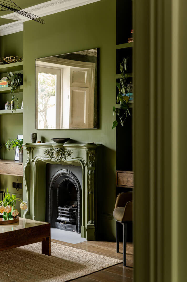 Best of 2024: Living Rooms 30 green living room with fireplace