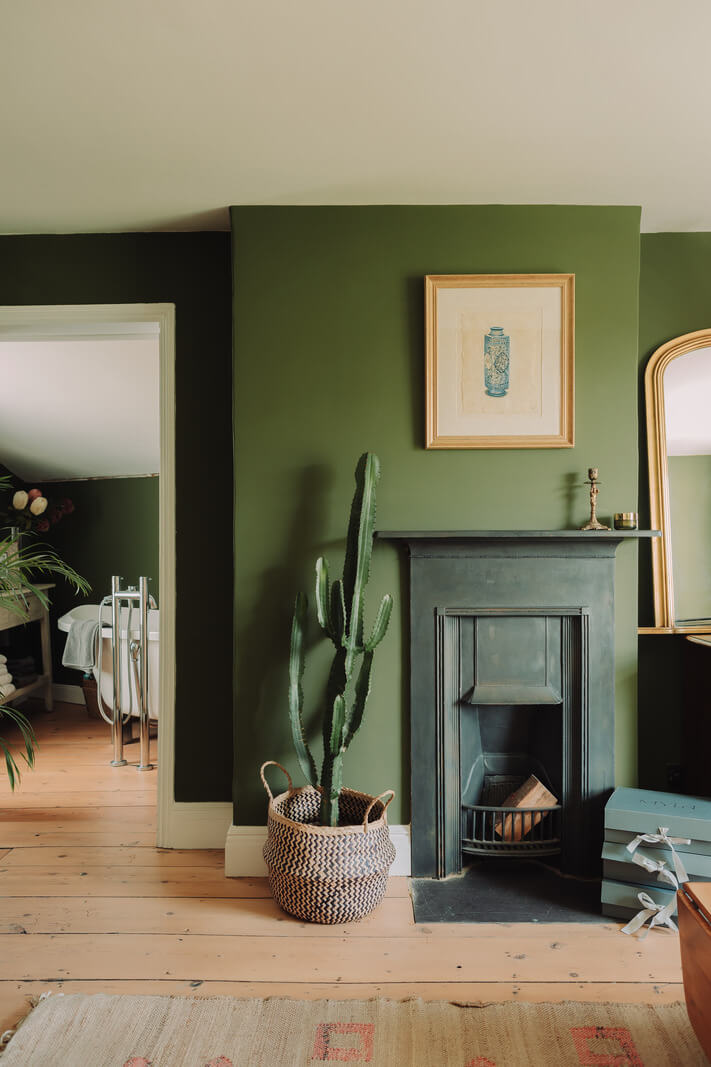 Colorful Rooms in an Elegant Georgian Home in England 17 green walls fireplace