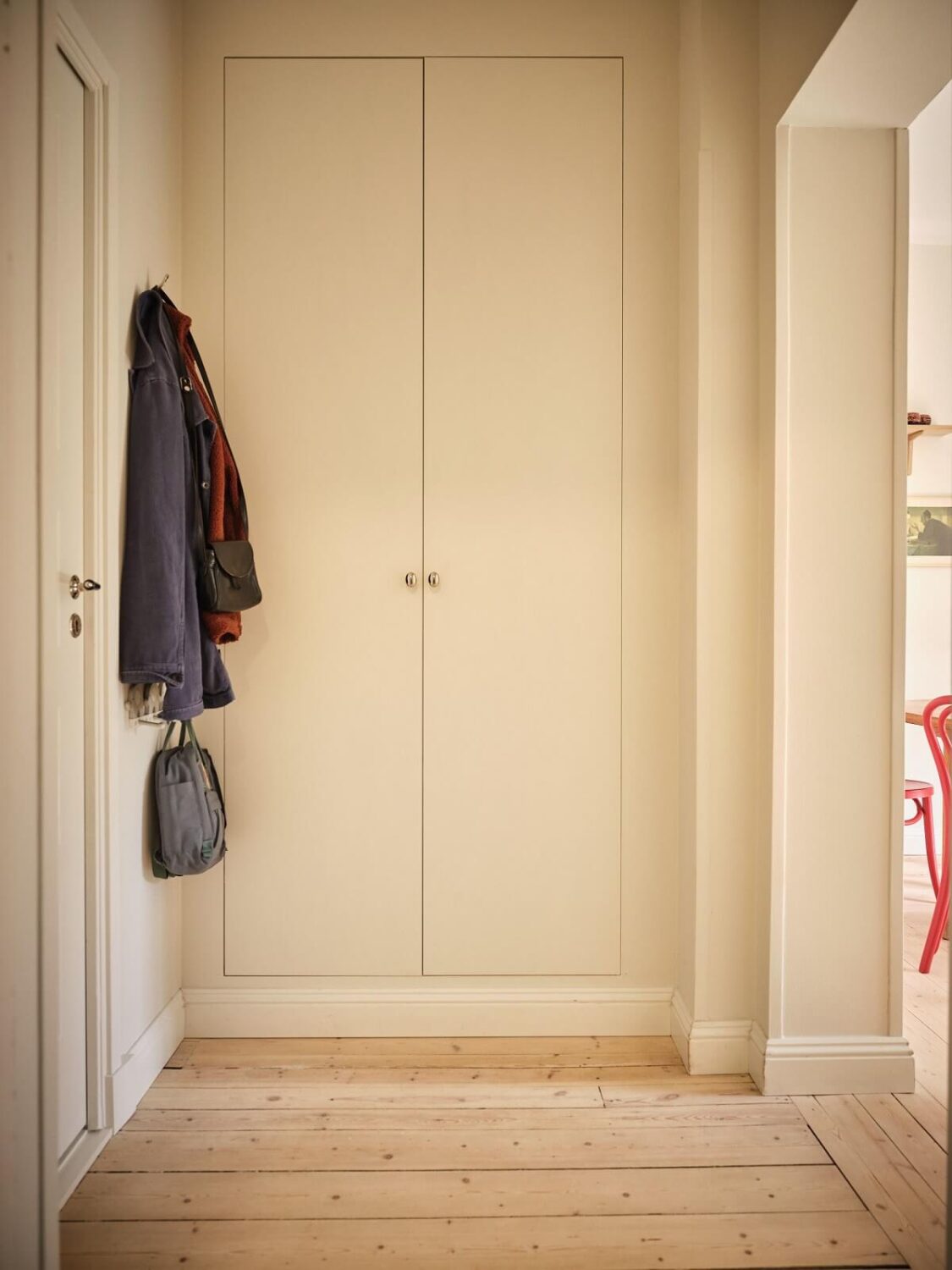 A Light Apartment with a Sage Green Kitchen 17 hall with built in wardrobes A Light Apartment with a Sage Green Kitchen