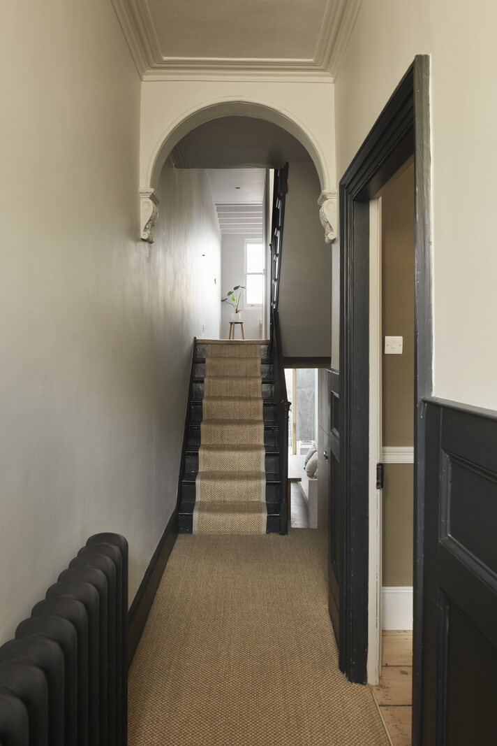 A Georgian Townhouse with a Modern Concrete Extension 5 hallway black paneling
