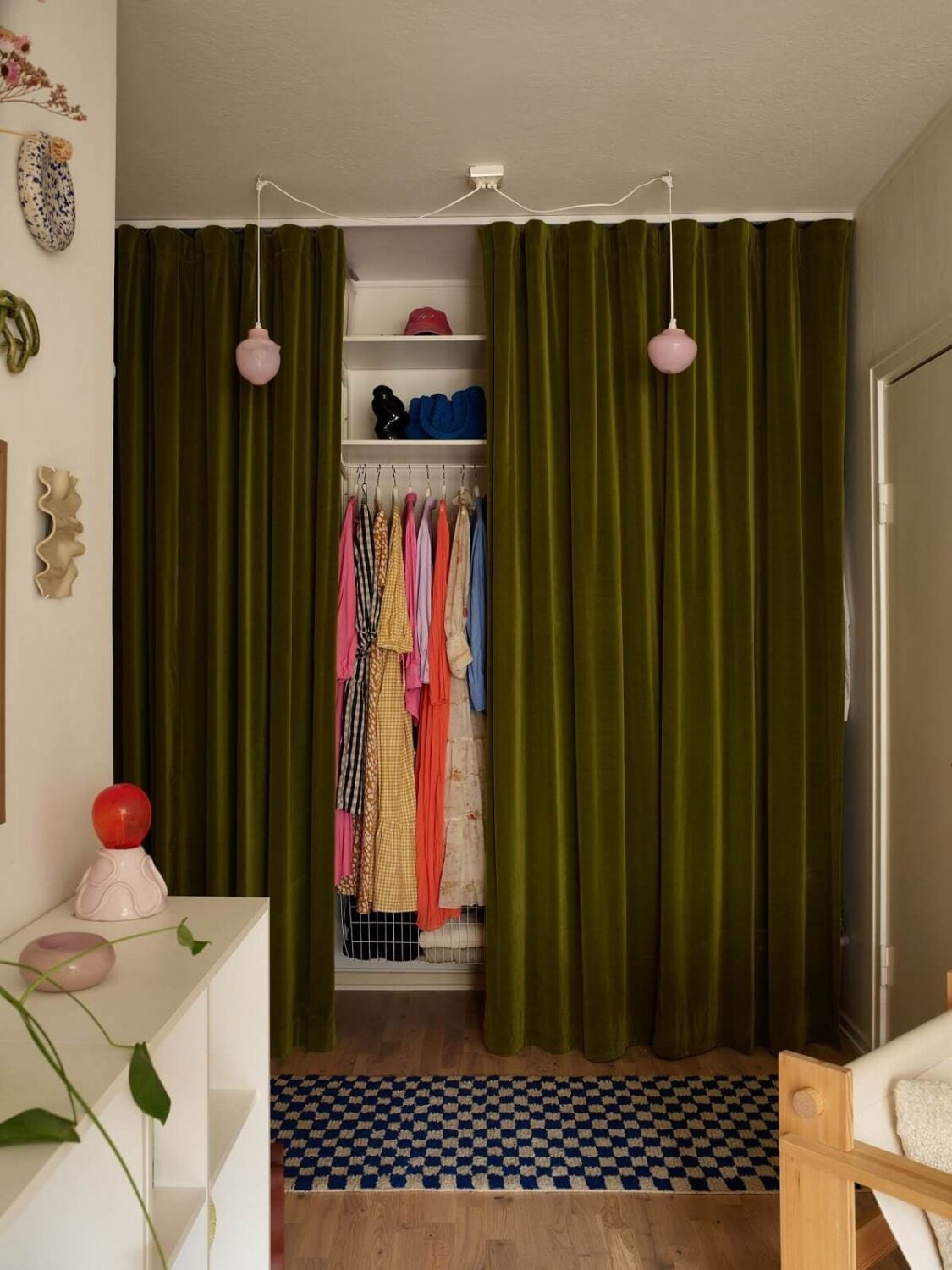 A Small Light Filled Apartment with Plants and Color 19 hallway storage with green curtain nordroom