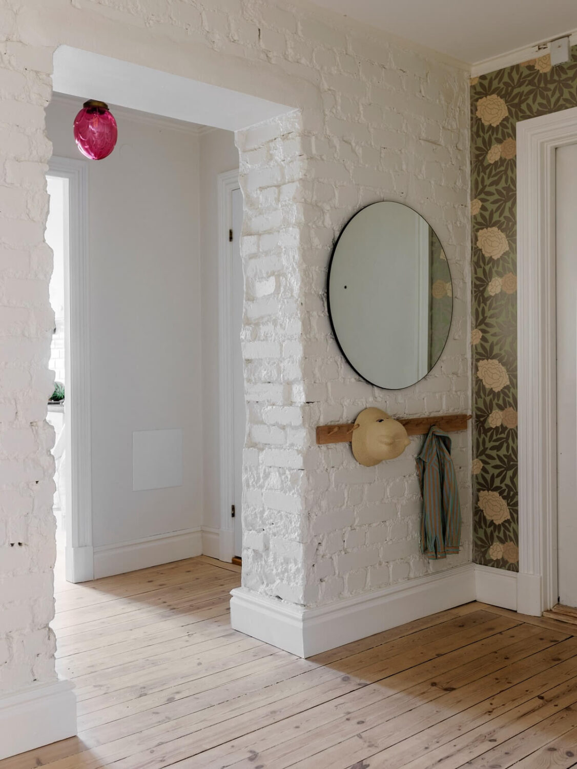 A Light Atmosphere and Wallpapers in a Swedish Apartment 26 hallway white painted brick walls nordroom