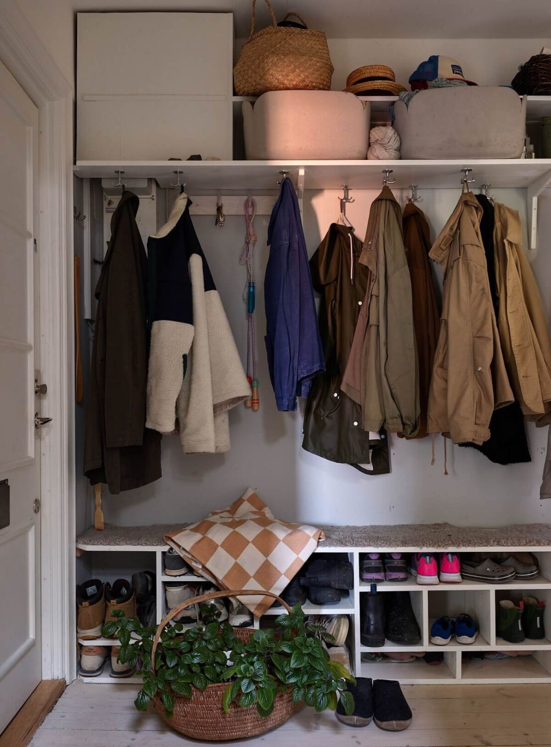 A Cozy Attic Apartment is a Charming Family Home 27 hallway with coat shoe storage