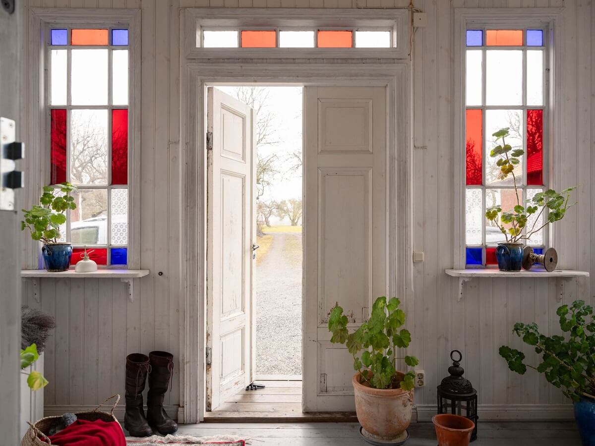 Original Character and Grand Rooms in a Swedish Country House 15 hallway with colored glass