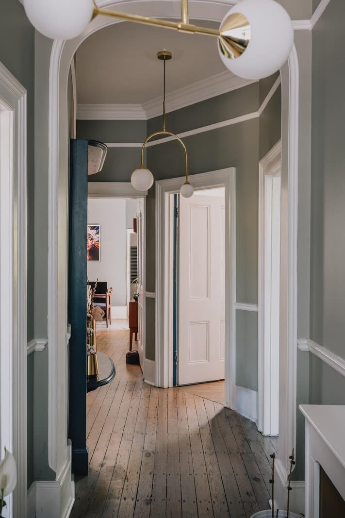 A Deep Blue Color Palette in a London Apartment 12 hallway with gray walls A Deep Blue Color Palette in a London Apartment