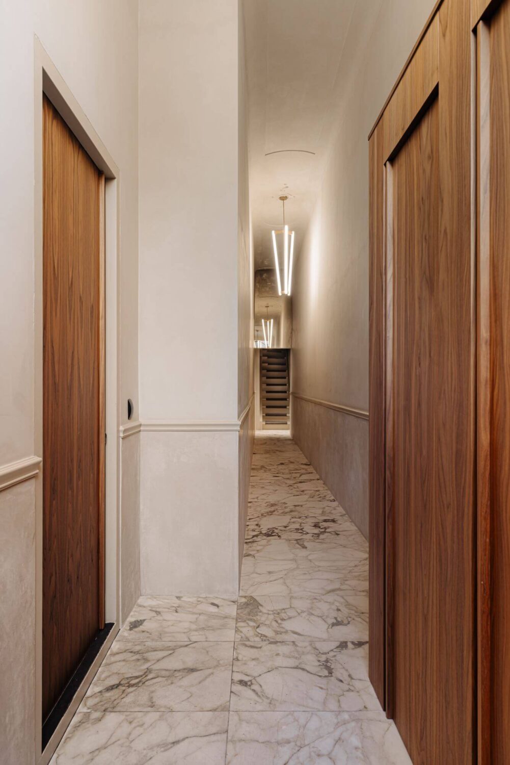 A Luxurious Apartment in an Amsterdam Canal House 29 hallway with marble tiles