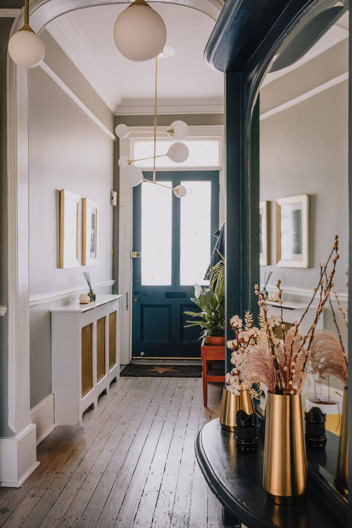 A Deep Blue Color Palette in a London Apartment 11 hallway with wooden floor A Deep Blue Color Palette in a London Apartment