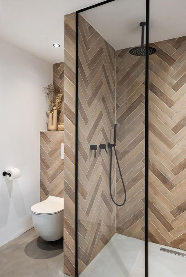 Loft Spaces in a Former School Conversion in Rotterdam 24 herring bone pattern bathroom tiles