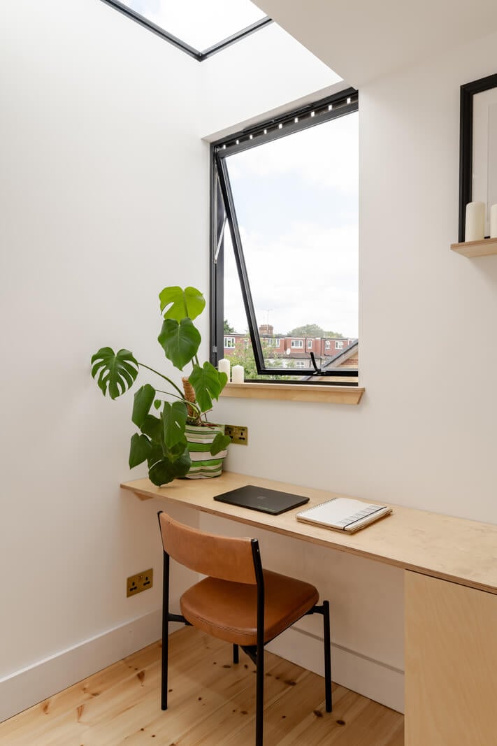 A London Terraced House with a Modern Kitchen Extension 10 home office minimalistic desk in front of window