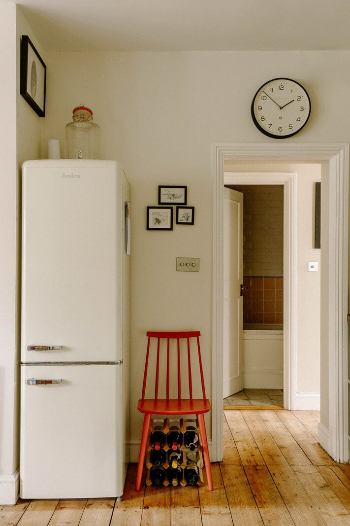 A Charming Apartment in a Victorian Villa 5 kitchen detail red chair A Charming Apartment in a Victorian Villa