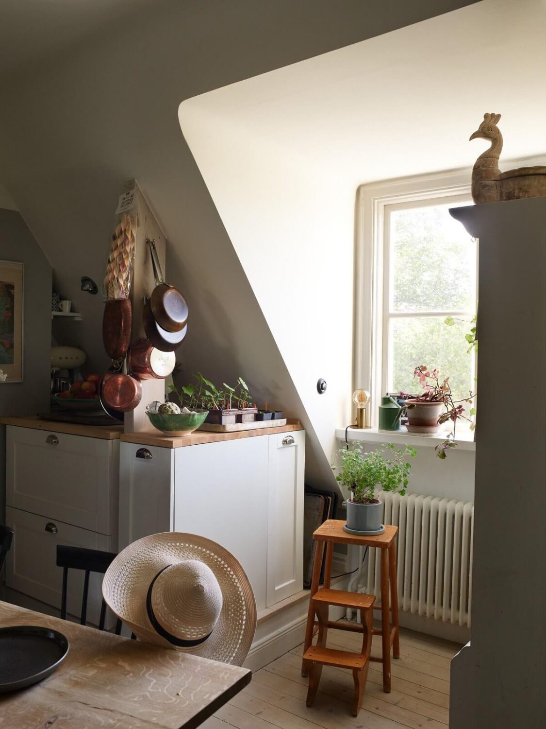 A Cozy Attic Apartment is a Charming Family Home 18 kitchen with dormer window