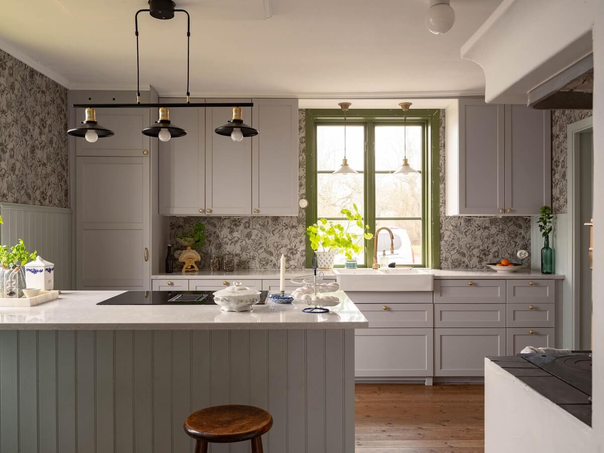 Original Character and Grand Rooms in a Swedish Country House 10 kitchen with island and wallpaper