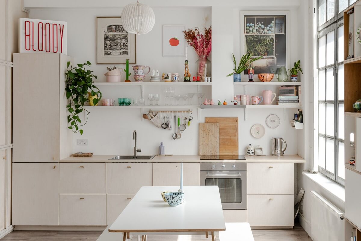 A Modern Scandinavian-Style Apartment in a Former London Mill 9 kitchen with shelf and large industrial window