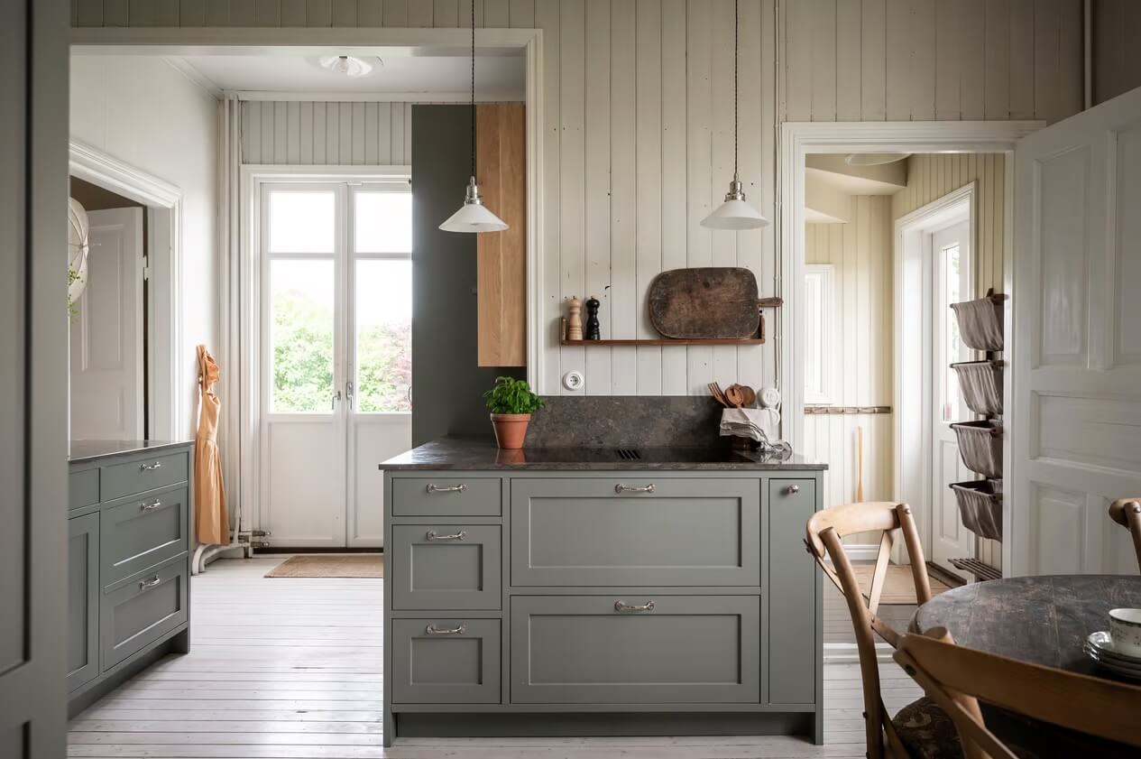 Original Charm in a Light Green Swedish Country House 11 kitchen wood paneled walls