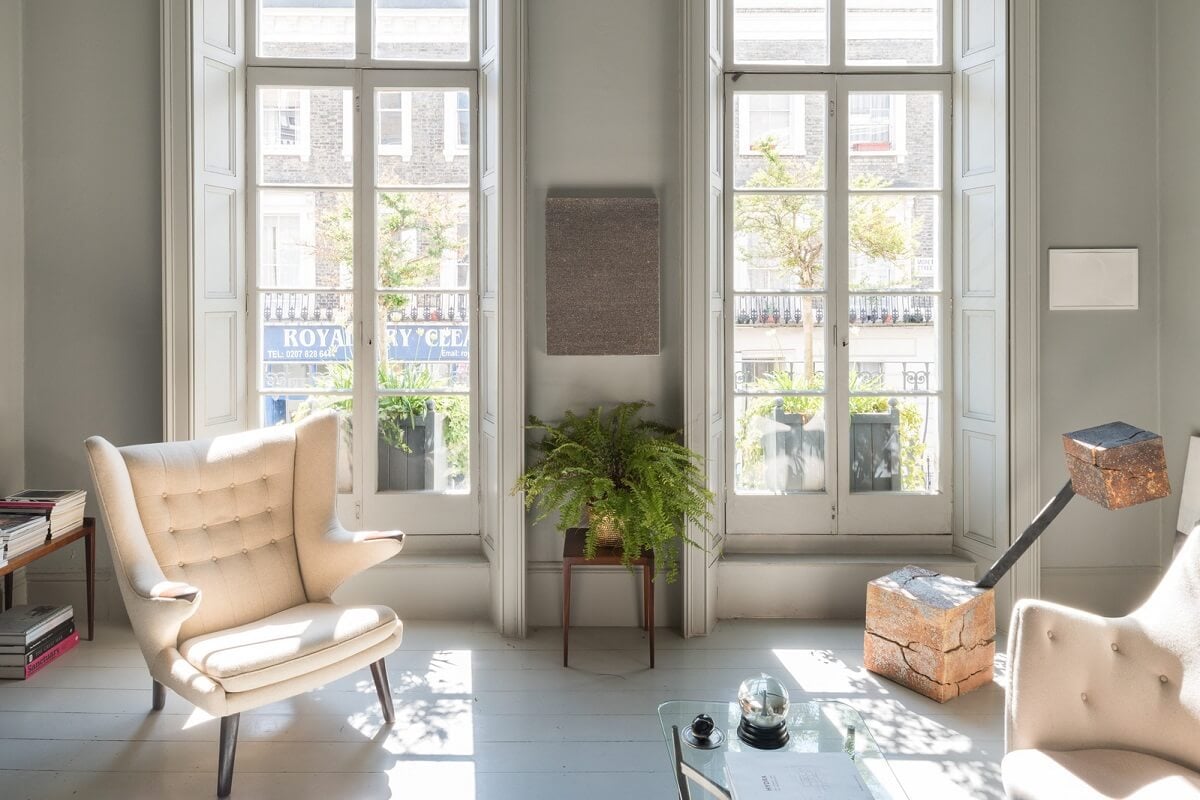 Heritage Colors and Original Details in a London Townhouse 2 large windows light gray living room