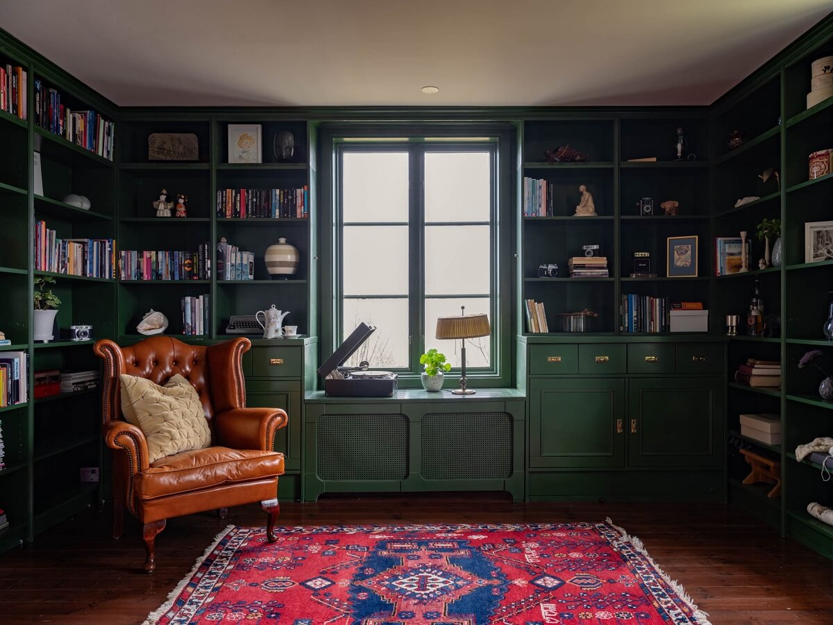 Original Character and Grand Rooms in a Swedish Country House 2 library room green built in bookshelves