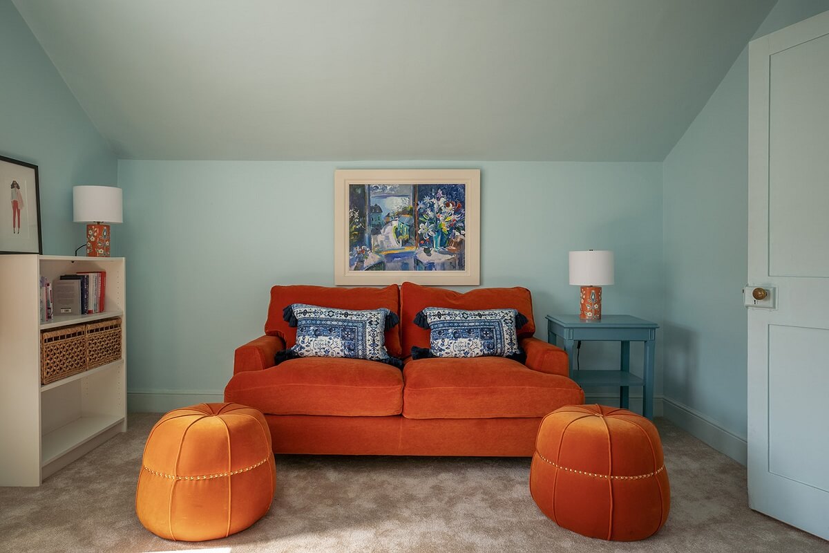 Colorful Interiors and Wallpapers in a Victorian House 15 light blue room with orange sofa