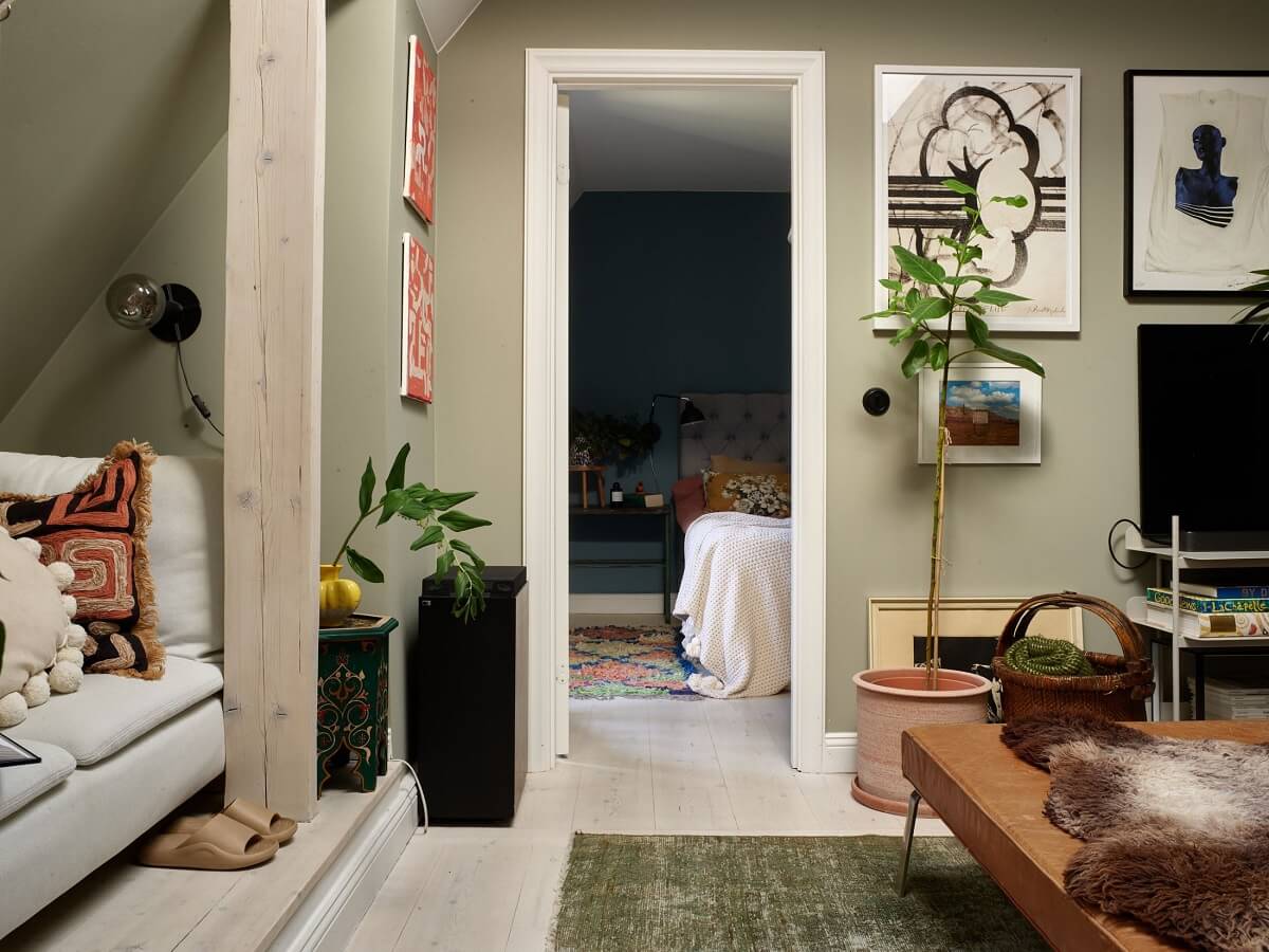 A Cozy Attic Apartment is a Charming Family Home 8 light gray living room with bedroom entry