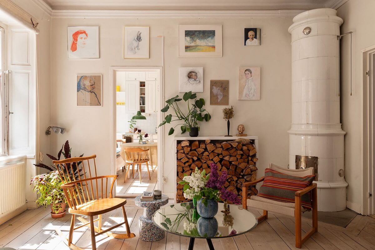Light and Charming Rooms in a Historic Stockholm Apartment 4 light living room with gallery wall and fireplace