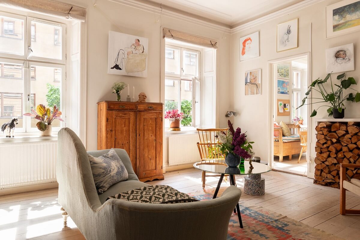 Light and Charming Rooms in a Historic Stockholm Apartment 2 light living room with gallery wall